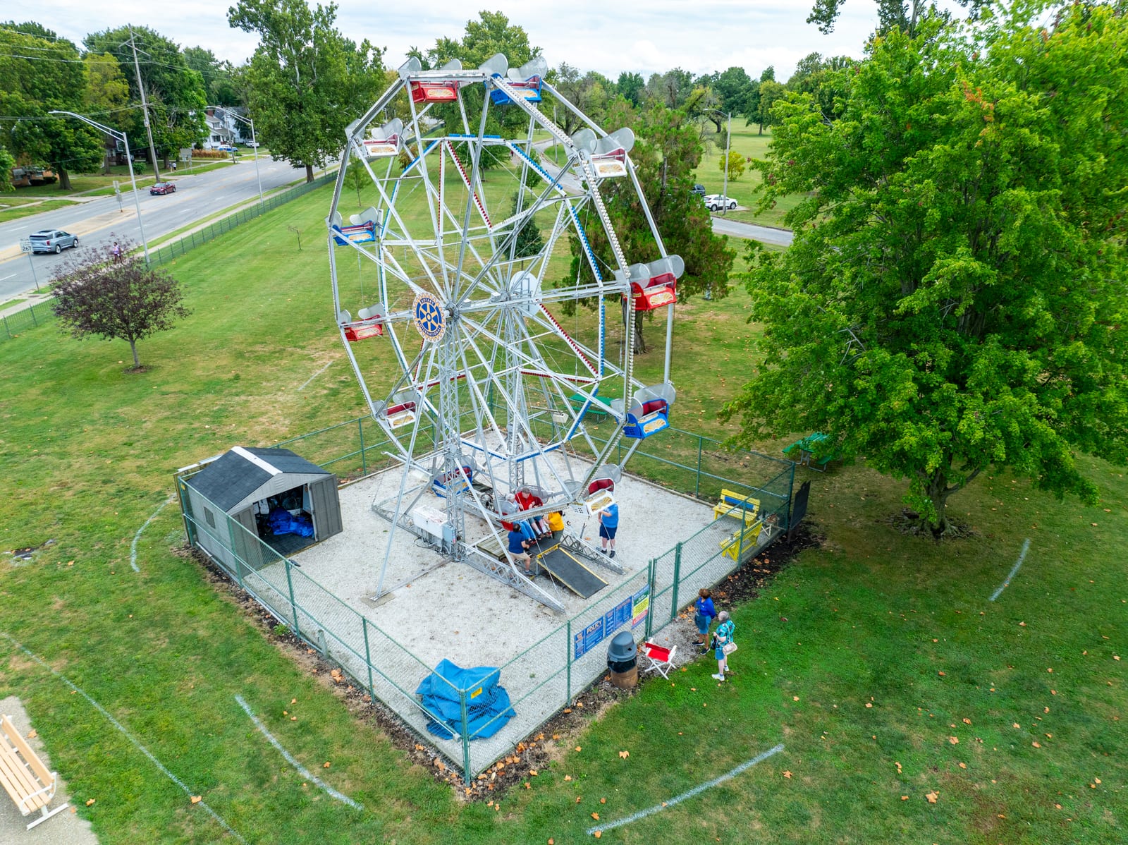 Overhead drone view of riders on the historic Big Eli Ferris Wheel in Jacksonville IL Community Park