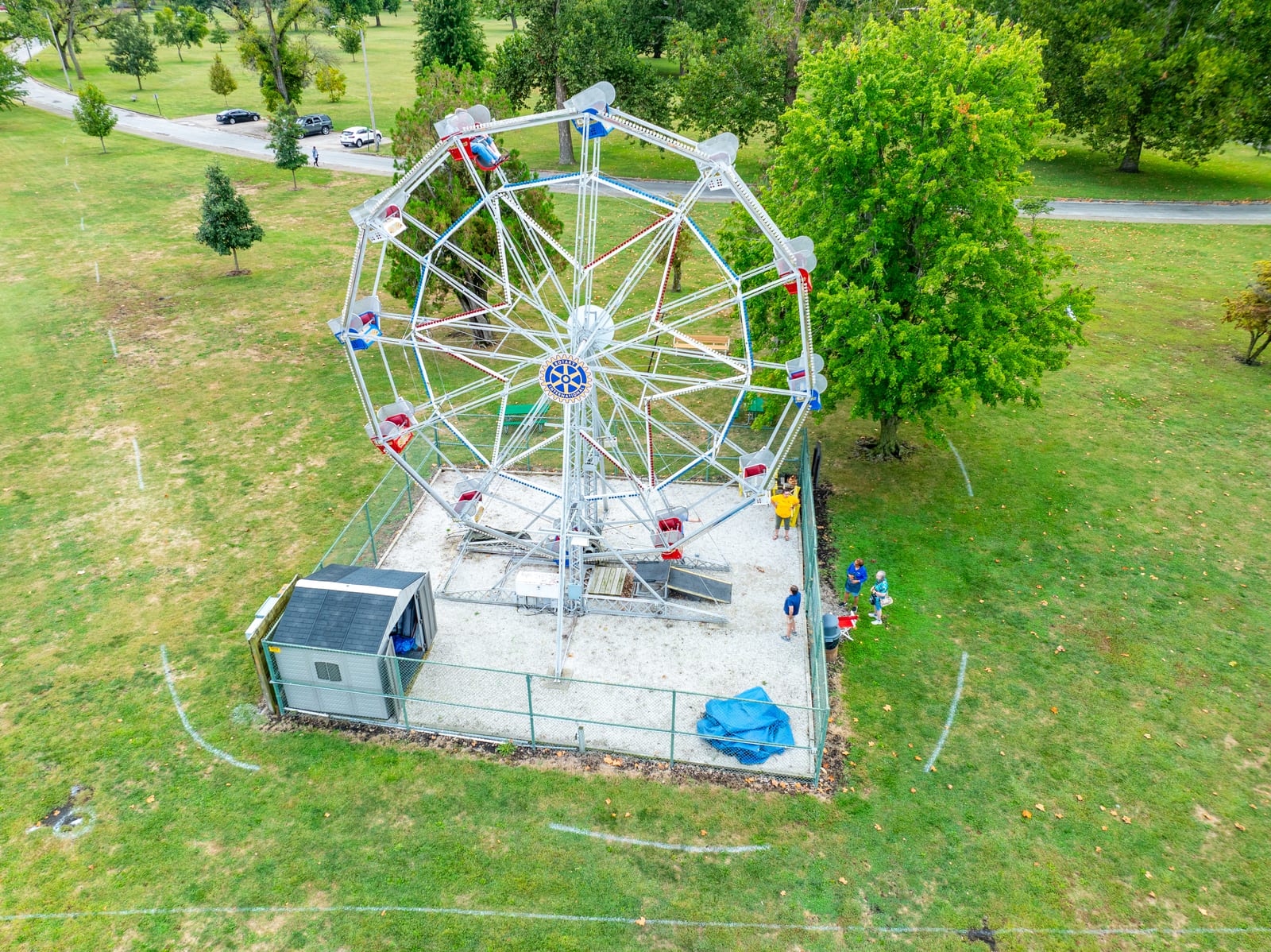 Top-down aerial photo of the Big Eli Ferris Wheel and its fenced platform in Community Park, Jacksonville Illinois