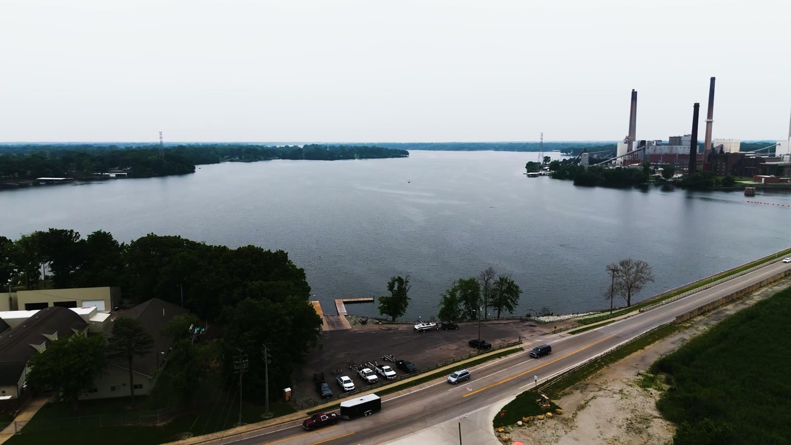 Aerial drone photo over Lake Springfield IL looking across the water toward the power plant stacks