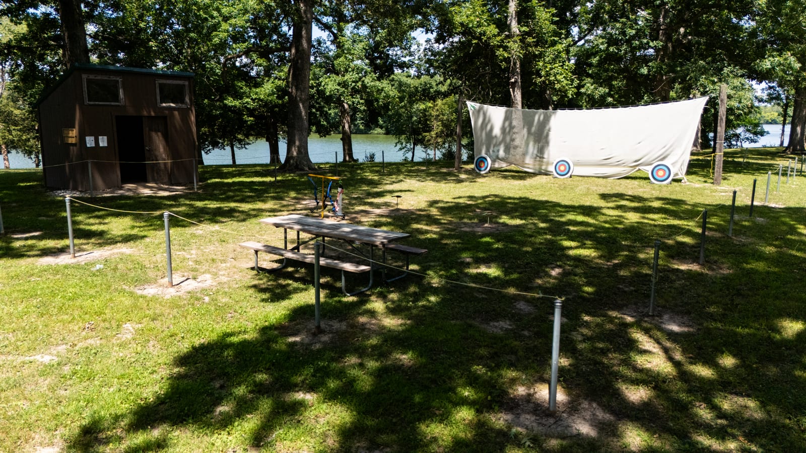 Archery range with targets and backstop netting in the woods at Western Illinois Youth Camp in Jacksonville IL