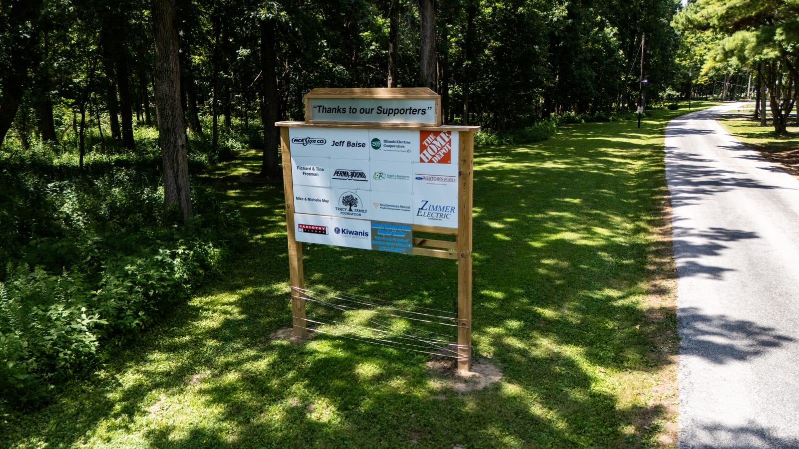 Thanks to our Supporters sponsor board at Western Illinois Youth Camp listing the local businesses and donors who keep the nonprofit camp running