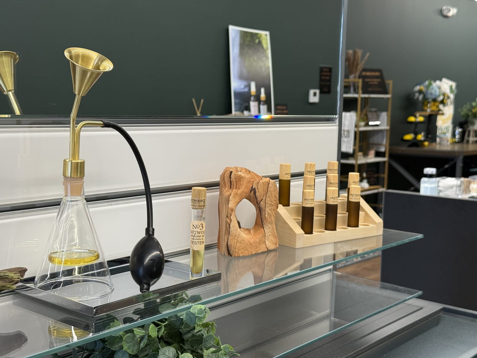 Luxury perfume oil bar with brass atomizer and Driftwood No. 3 fragrance at Cheryl Kelly & Co. in Jacksonville Illinois